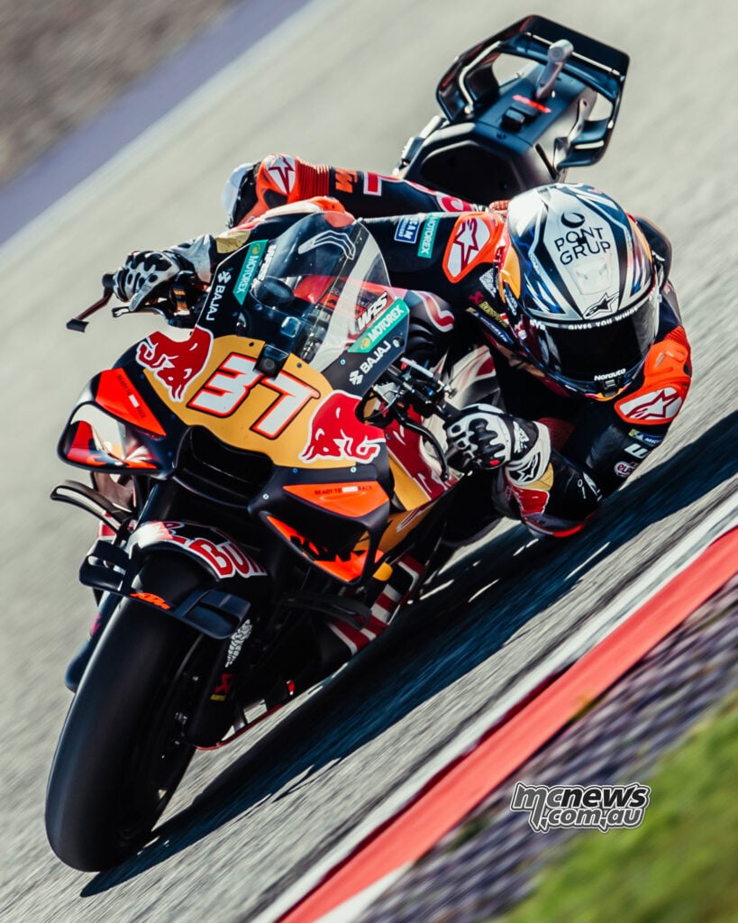 Pedro Acosta leaning his number 37 Red Bull KTM into a corner at the Red Bull Ring.