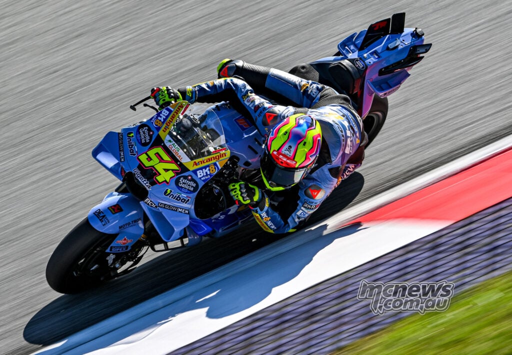 Fermin Aldeguer leaning his blue number 54 Gresini Ducati through a corner at the Austrian Grand Prix.