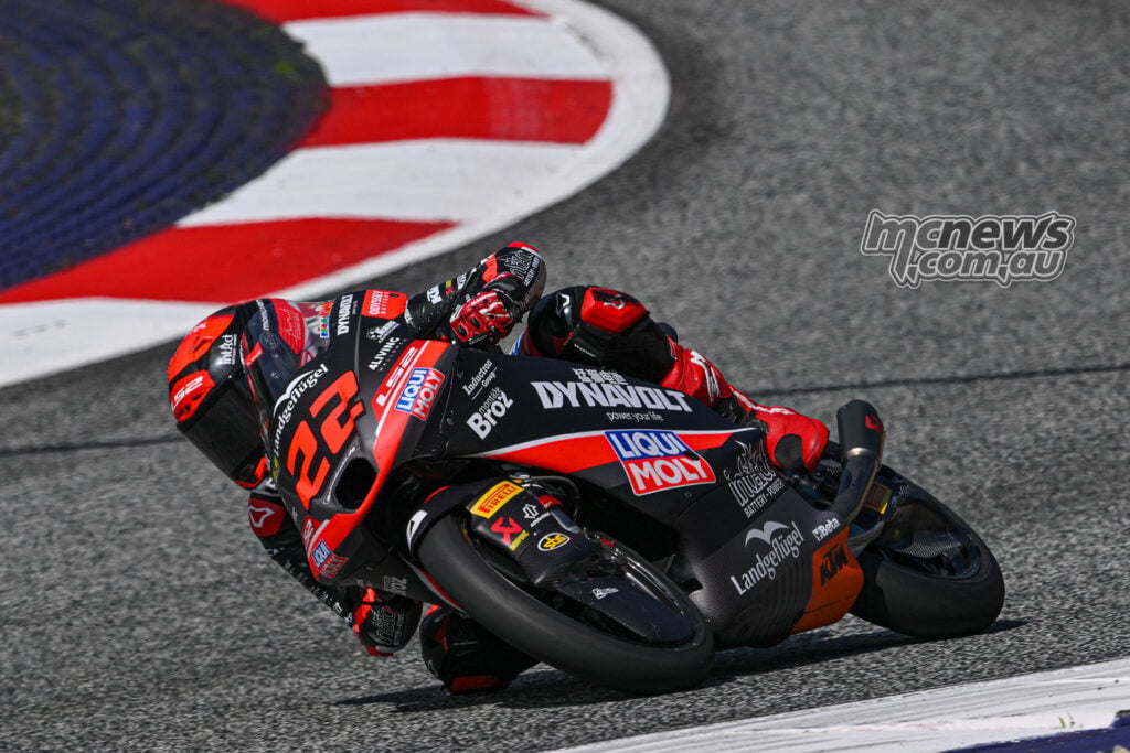 David Almansa leaning his number 22 Intact GP KTM through a corner during Moto3 practice in Austria.