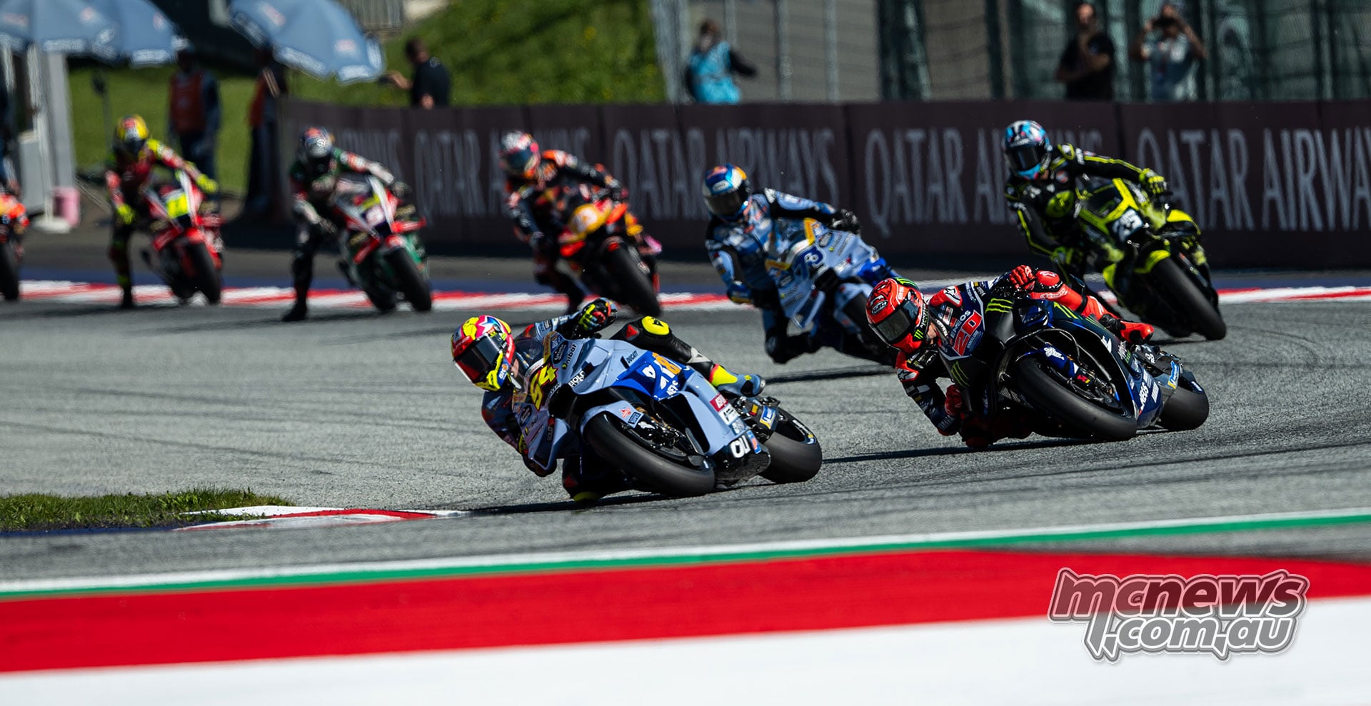 Fermin Aldeguer leads Fabio Quartararo, Raul Fernandez and Alex Marquez through a corner.