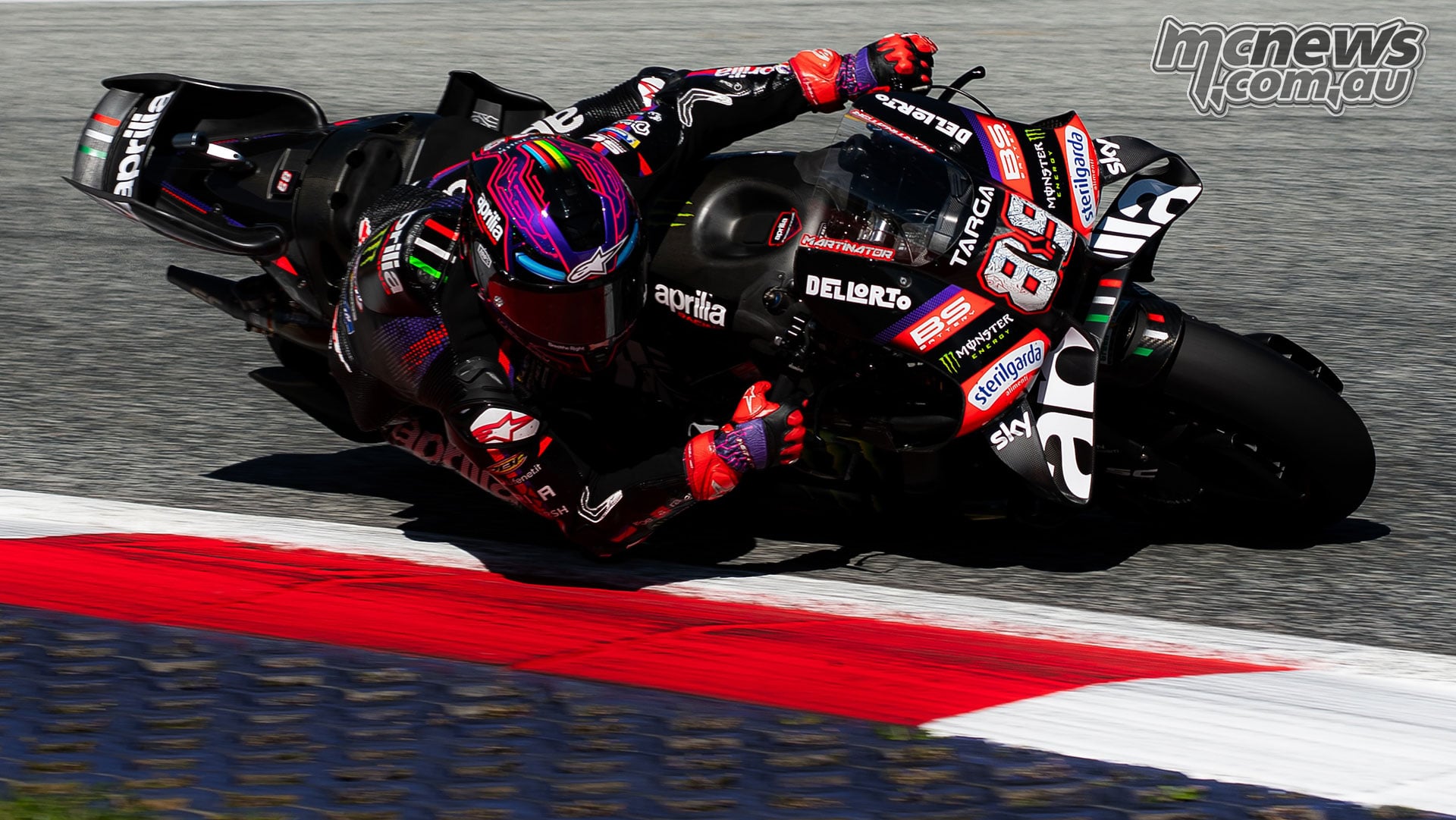 Jorge Martin leans his number 89 Aprilia into a right-hand corner at the Red Bull Ring.