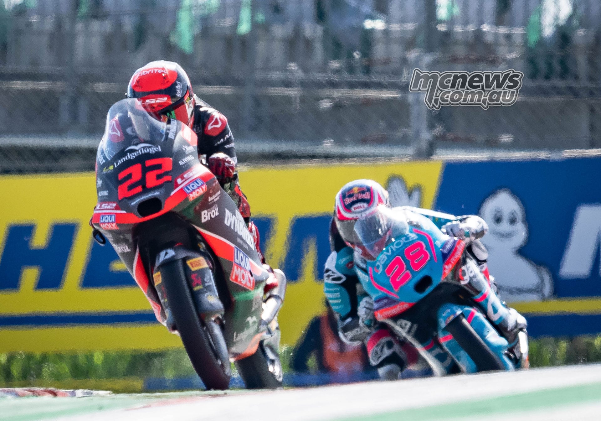 David Almansa crests a rise on his number 22 KTM with Maximo Quiles following on the number 28 machine.