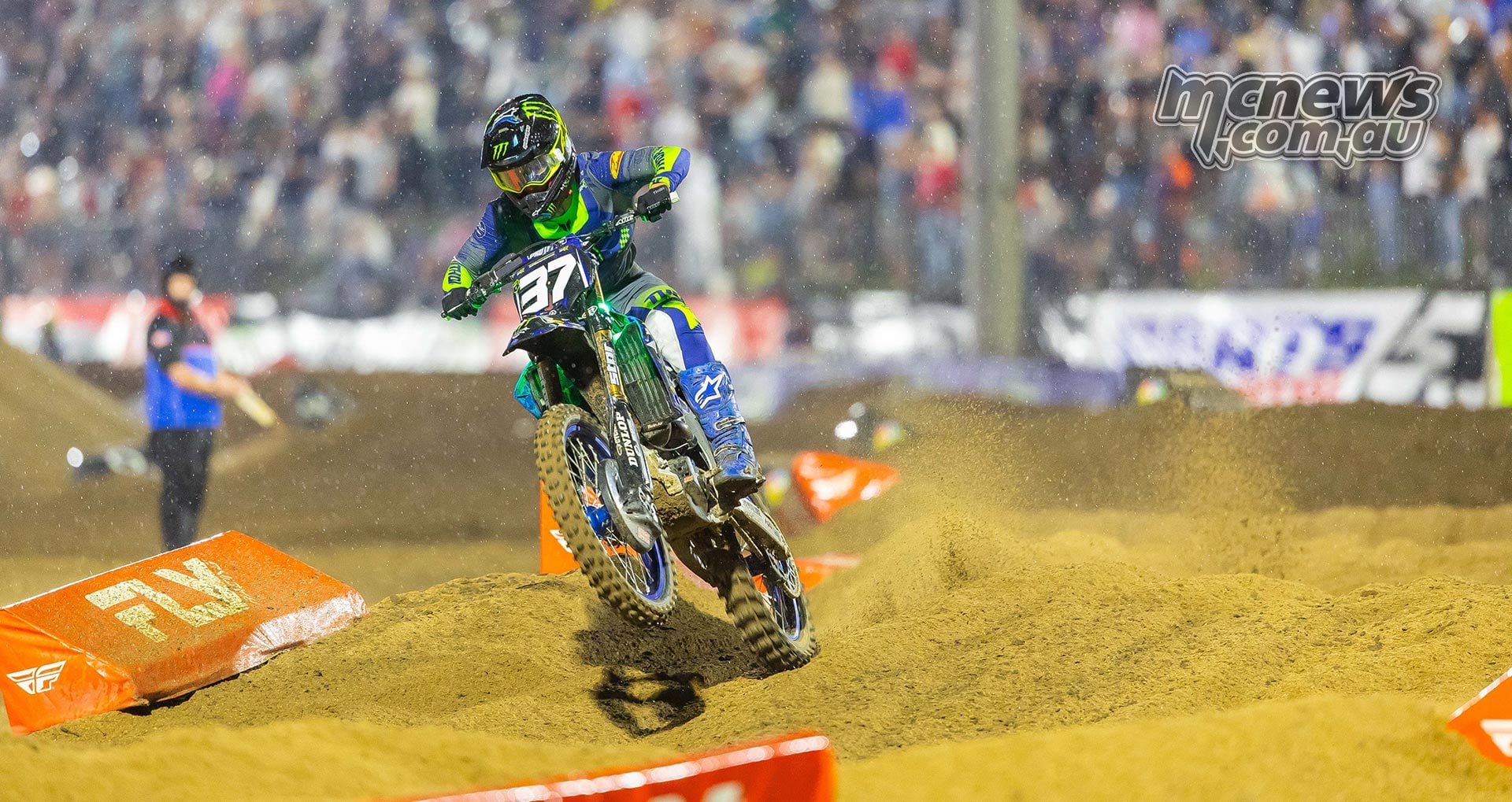 Cole Davies rides his number 37 Yamaha through the sandy circuit.