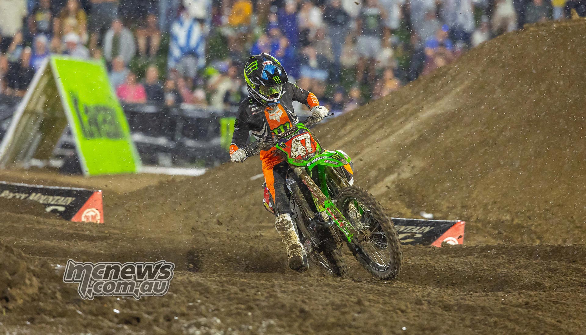 Levi Kitchen leans his number 47 Kawasaki into a sandy turn.