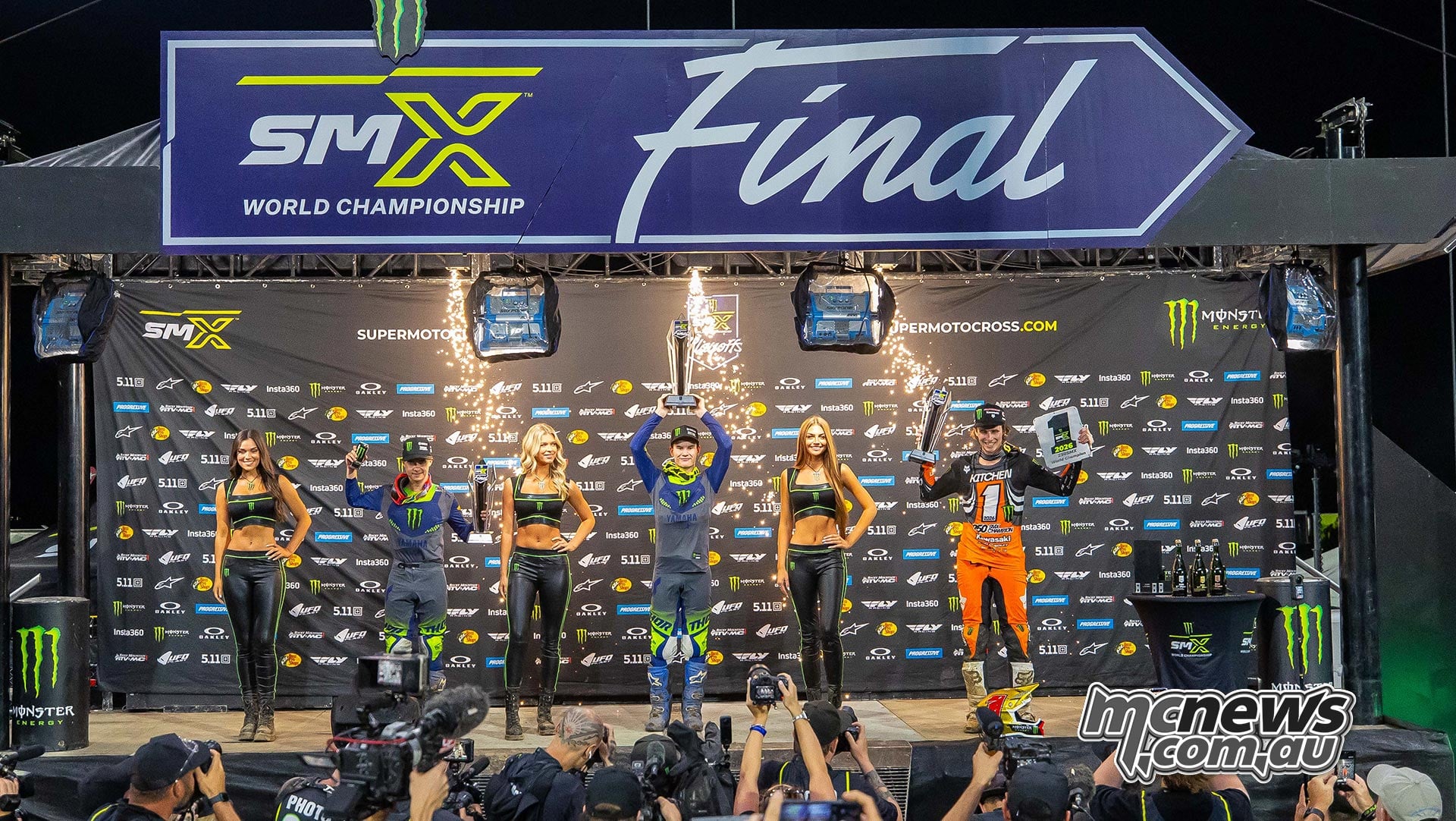 Landen Gordon, round winner Cole Davies and Levi Kitchen with their trophies on the 250 podium.