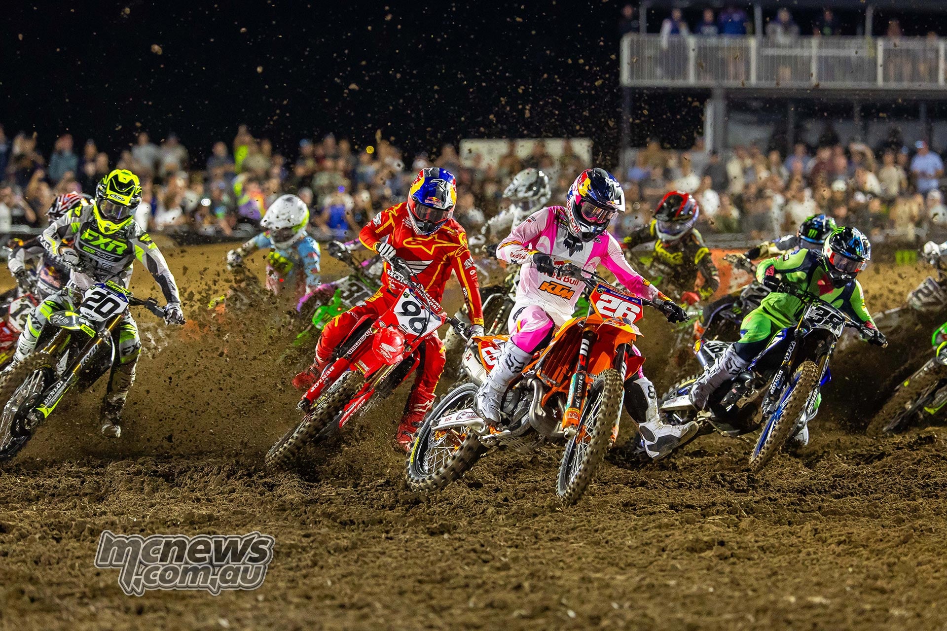 Jorge Prado, Hunter Lawrence and Haiden Deegan lead the 450 field through a sandy turn.