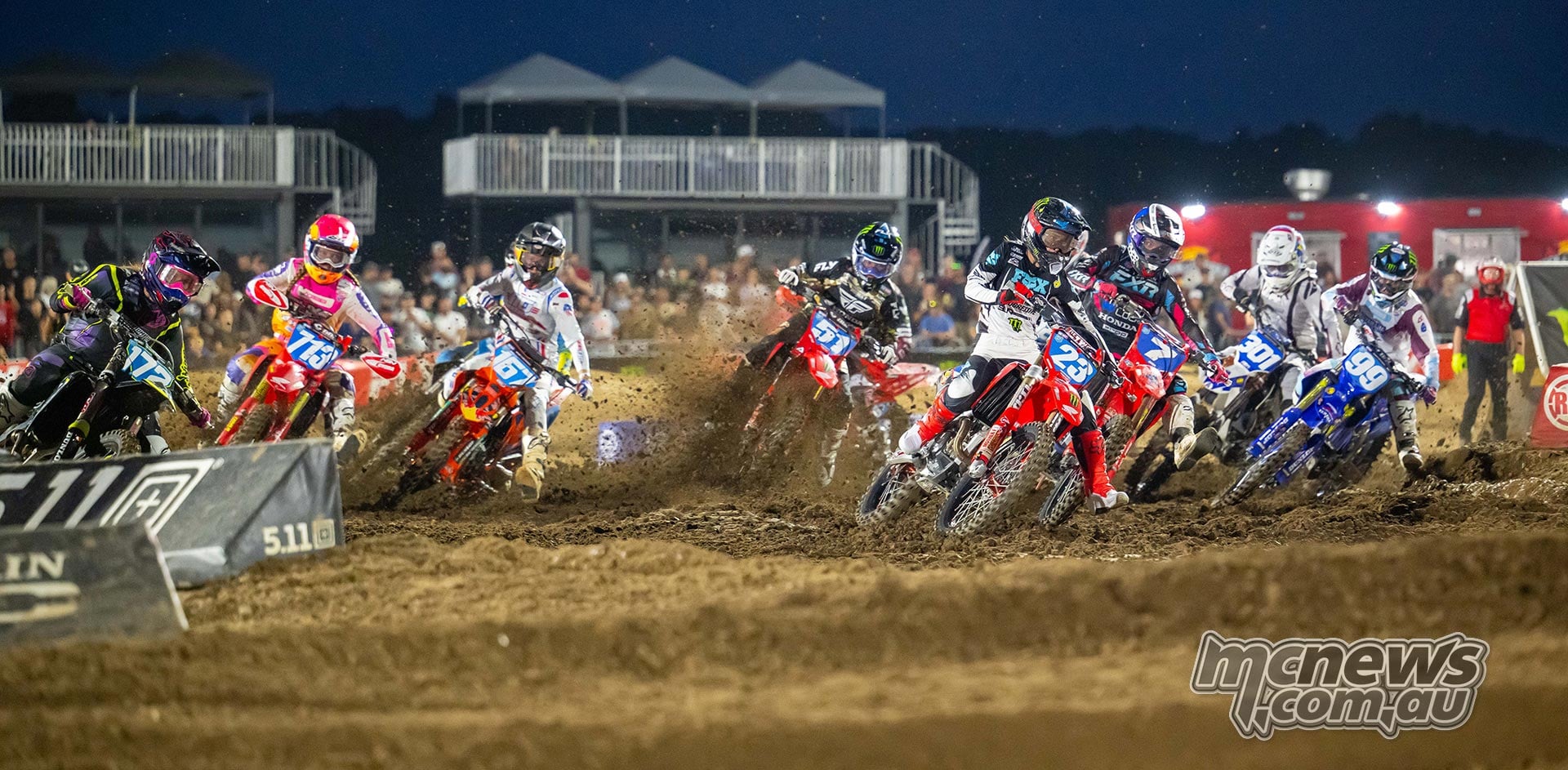 WMX riders race through the first turn, with Mayla Herrick, Charli Cannon and Hannah Hodges prominent.