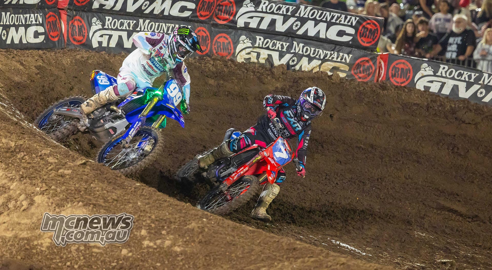 Lachlan Turner on the number 99 Yamaha and Charli Cannon on the number 7 Honda race through a corner.