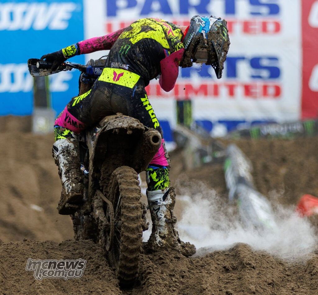 Cole Davies looks down at his stopped Yamaha as a white plume rises beside the bike on a muddy jump at Columbus.
