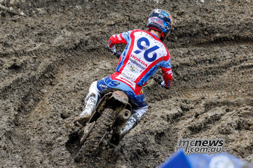 Hunter Lawrence guides his number 96 Honda through deep mud and ruts during the second 450 moto.