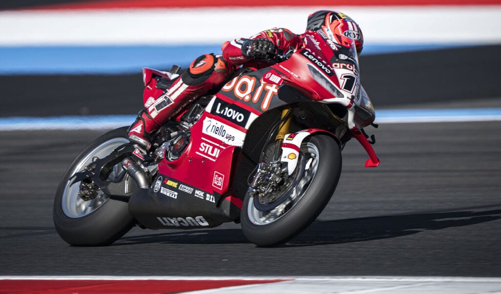 Front three-quarter view of Nicolo Bulega riding the number 11 Ducati Panigale V4 R at Magny-Cours.