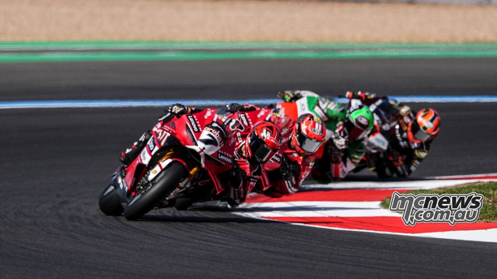 Iker Lecuona leads Nicolo Bulega, Sam Lowes and the closely grouped WorldSBK field through a corner at Magny-Cours.