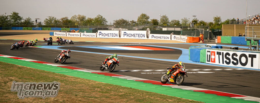 Yari Montella leads Alex Lowes, Tommy Bridewell and the WorldSBK field through Magny-Cours.