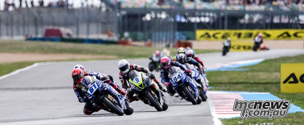 Can Oncu’s blue number 61 Yamaha leads a line of WorldSSP motorcycles through a right-hand bend.