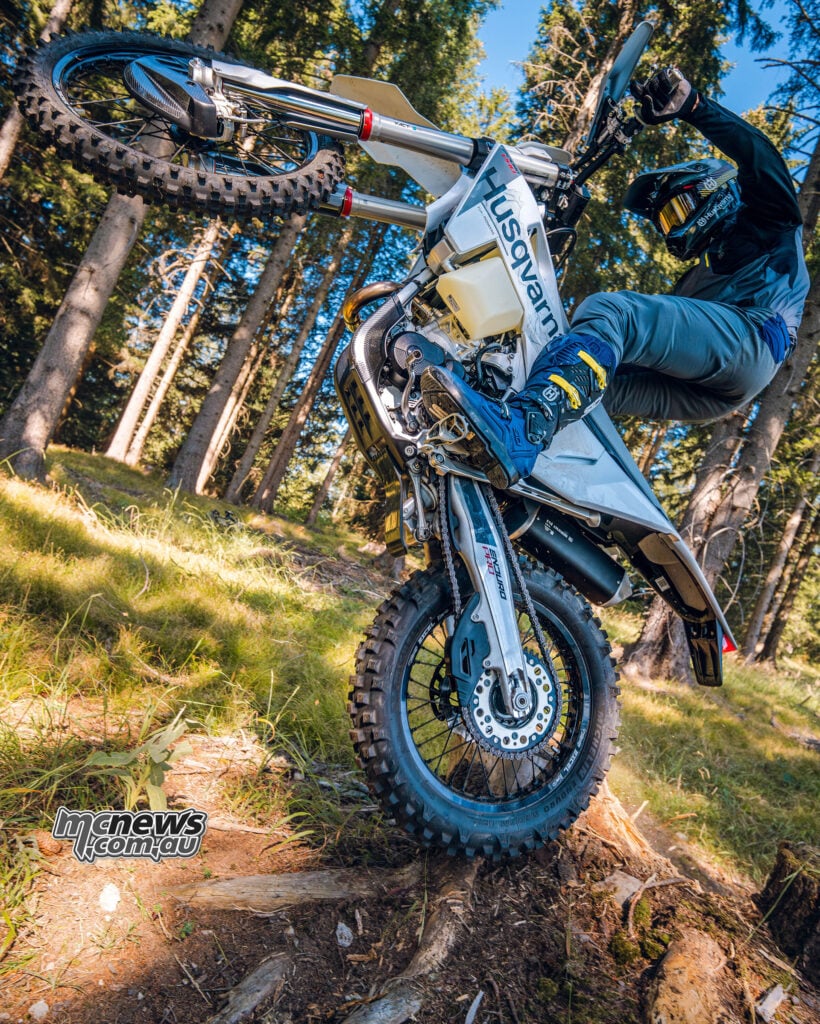 Rider on 2027 Husqvarna FE 350 Pro four-stroke enduro motorcycle in forest
