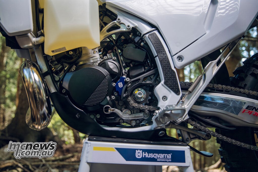 The TE 300 Pro uses Husqvarna's 293.2 cc throttle-body-injected two-stroke, with electronic oil injection and electric starting.