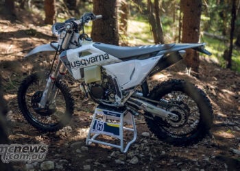 2027 Husqvarna TE 300 Pro two-stroke enduro motorcycle in forest terrain