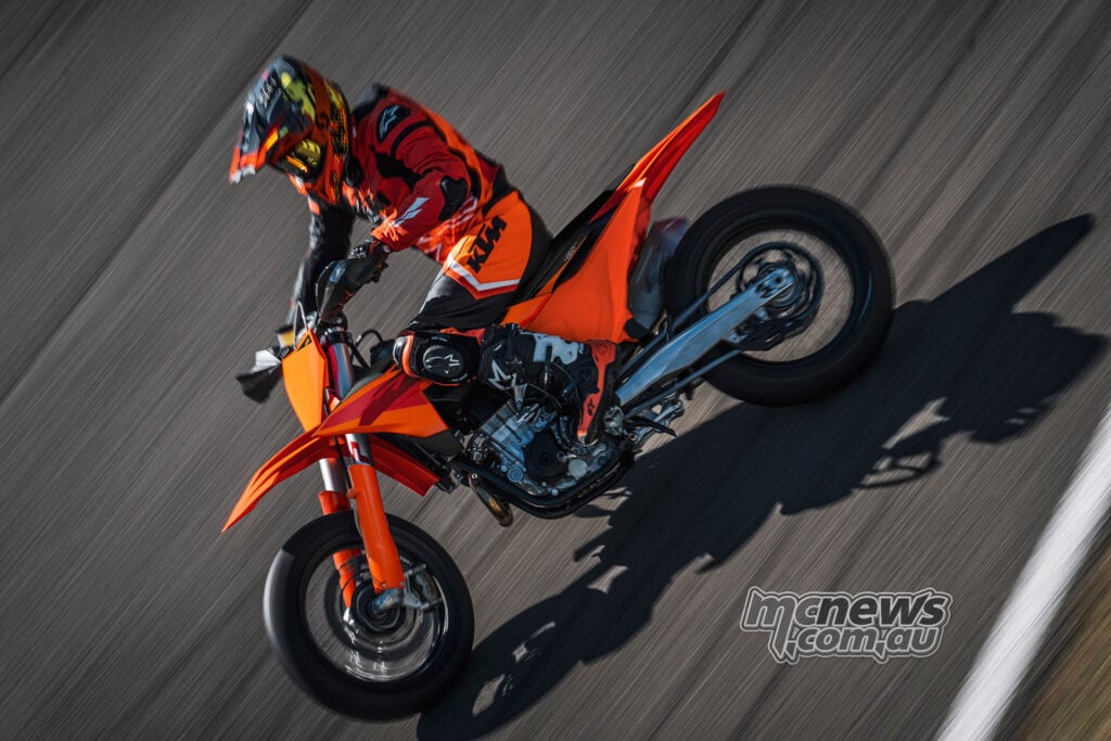 Overhead view of a rider cornering the 2027 KTM 450 SMR on an asphalt circuit