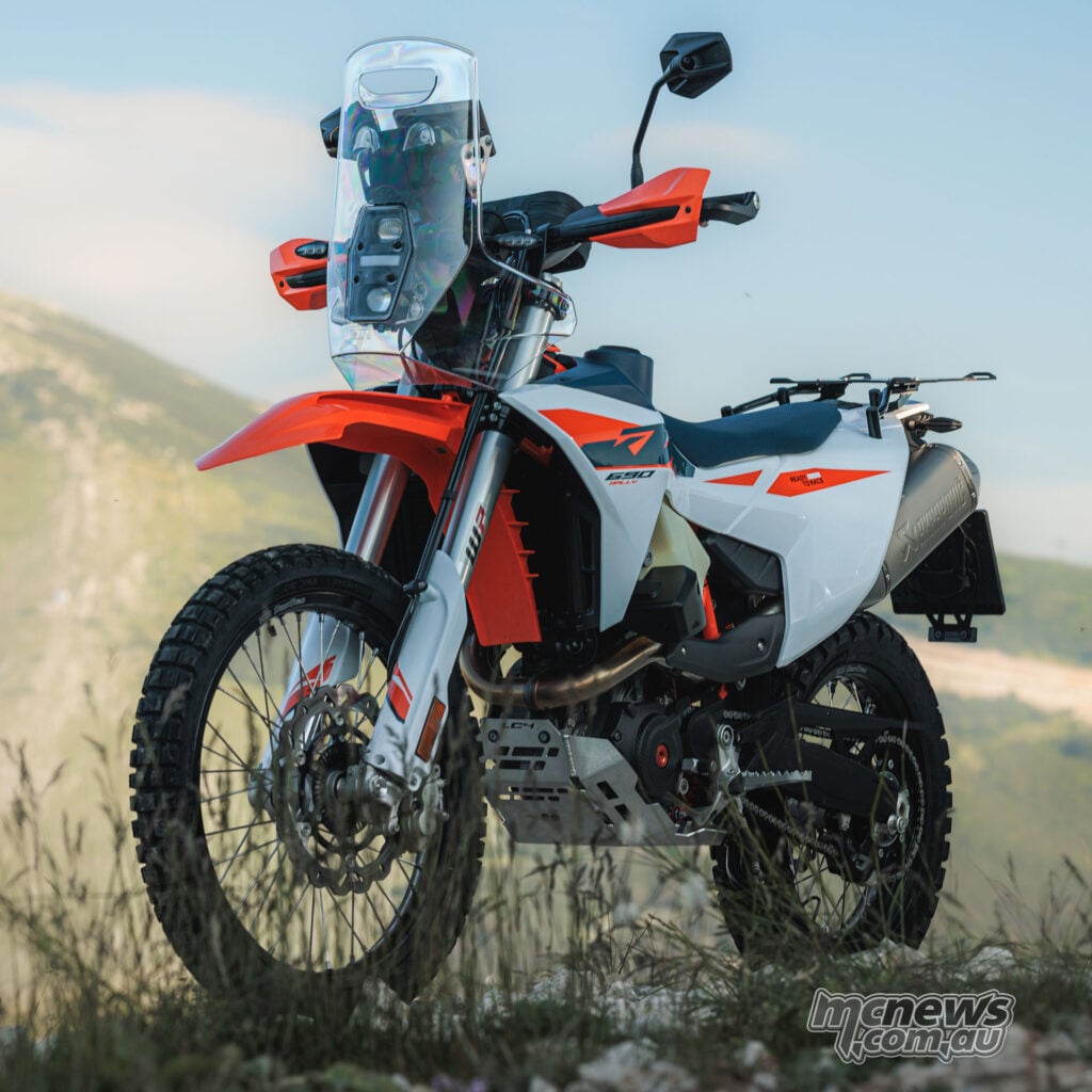 2027 KTM 690 Rally front three-quarter view showing rally tower, windscreen and front bodywork