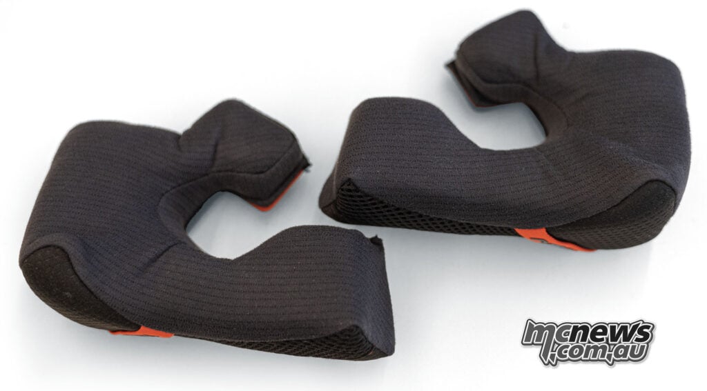 Top view of the removable black cheek pads from the Cardo Venture off-road helmet.