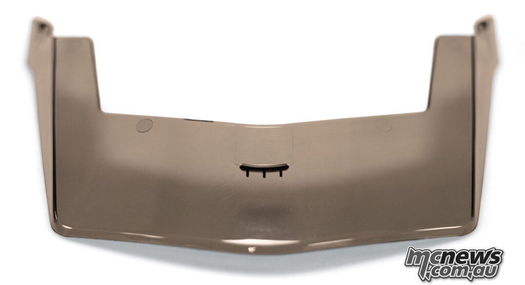 Dark tinted Cardo Venture helmet peak extension displayed on a white background.