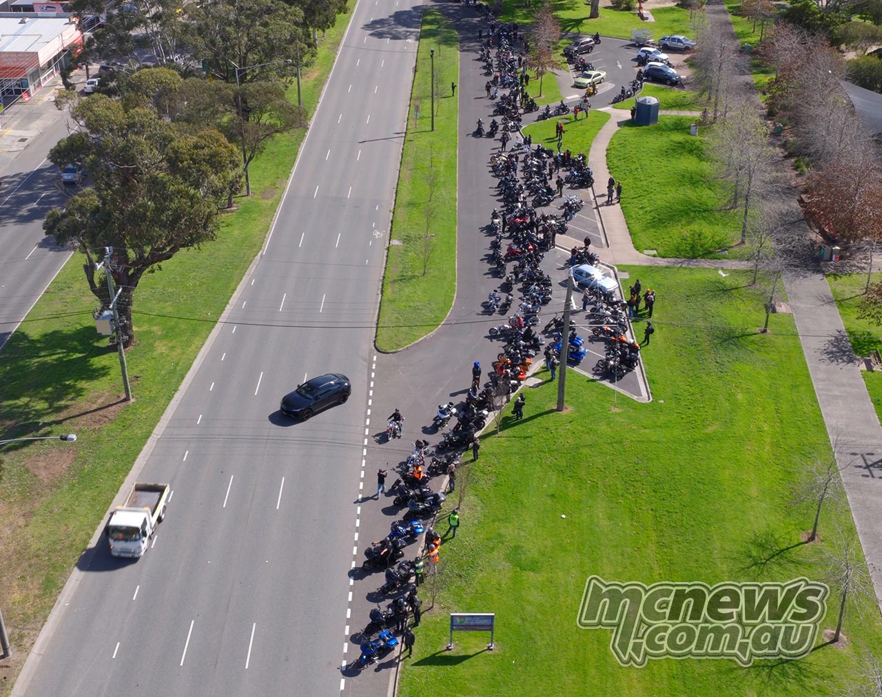 Aerial view of motorcycles gathered along a roadside during the 2026 Harley-Davidson United We Ride charity event
