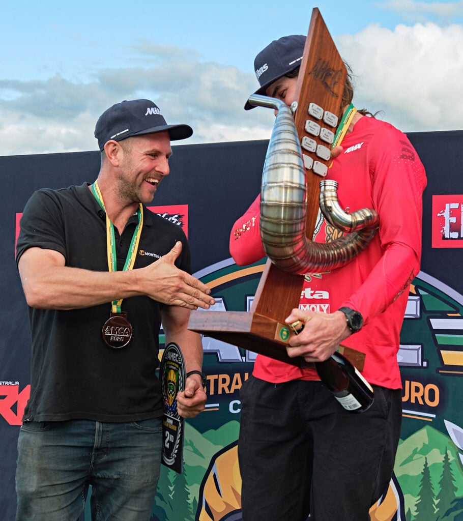 Wade Ibrahim congratulates 2026 Australian Hard Enduro Championship Gold class winner Ruben Chadwick on the podium.