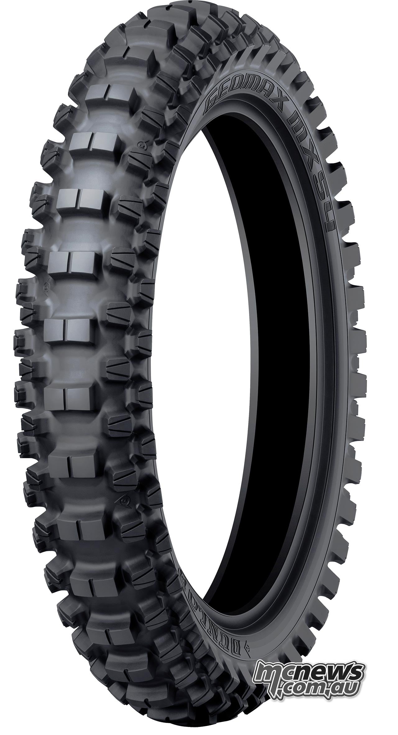 Studio product photograph of the Dunlop Geomax MX54 rear motocross tyre with large centre tread blocks and staggered shoulder knobs.