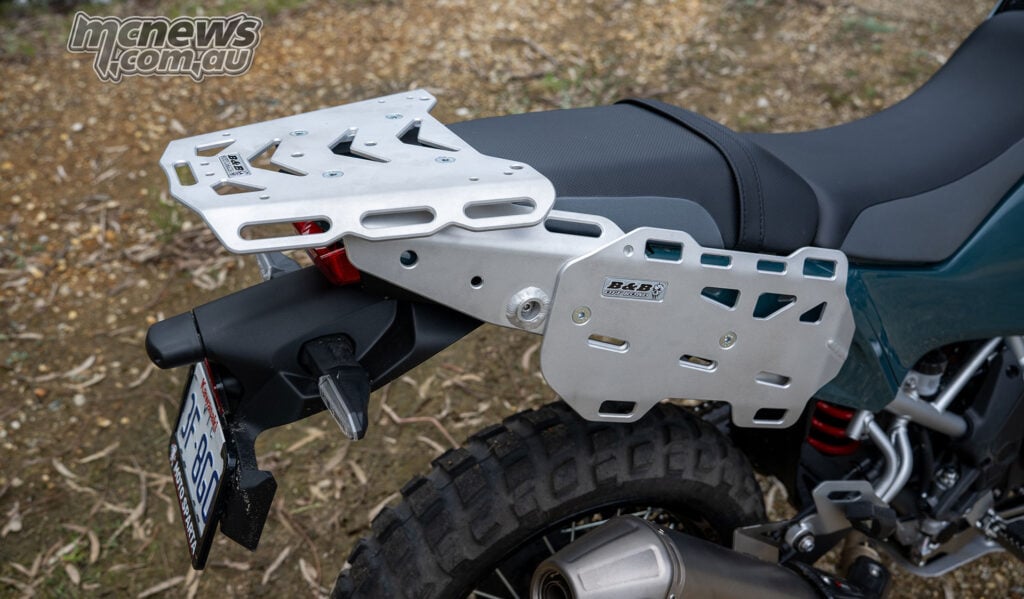 Rear three-quarter view of the satin-silver B&B tail rack and side luggage panel fitted to the Kawasaki KLE500 SE.