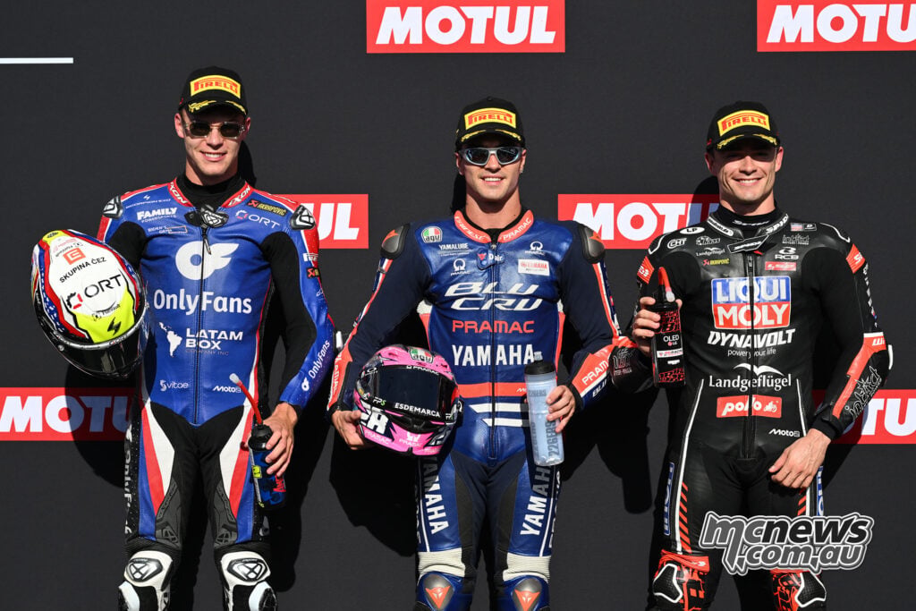 Filip Salac, Izan Guevara and Manuel Gonzalez pose after Moto2 qualifying at Motegi.