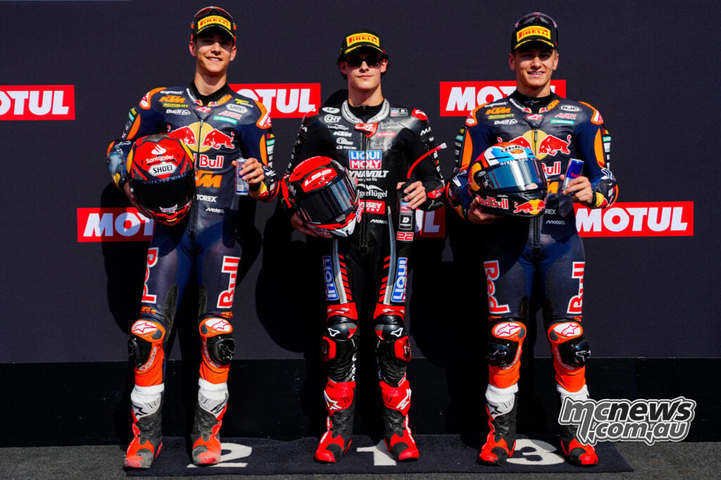 Brian Uriarte, David Almansa and Alvaro Carpe pose after Moto3 qualifying at Motegi.