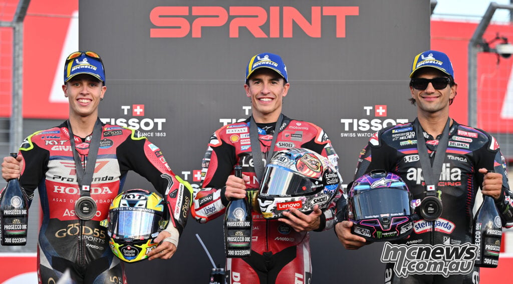 Marc Marquez, Diogo Moreira and Jorge Martin on the podium after the 2026 Motegi MotoGP Sprint.