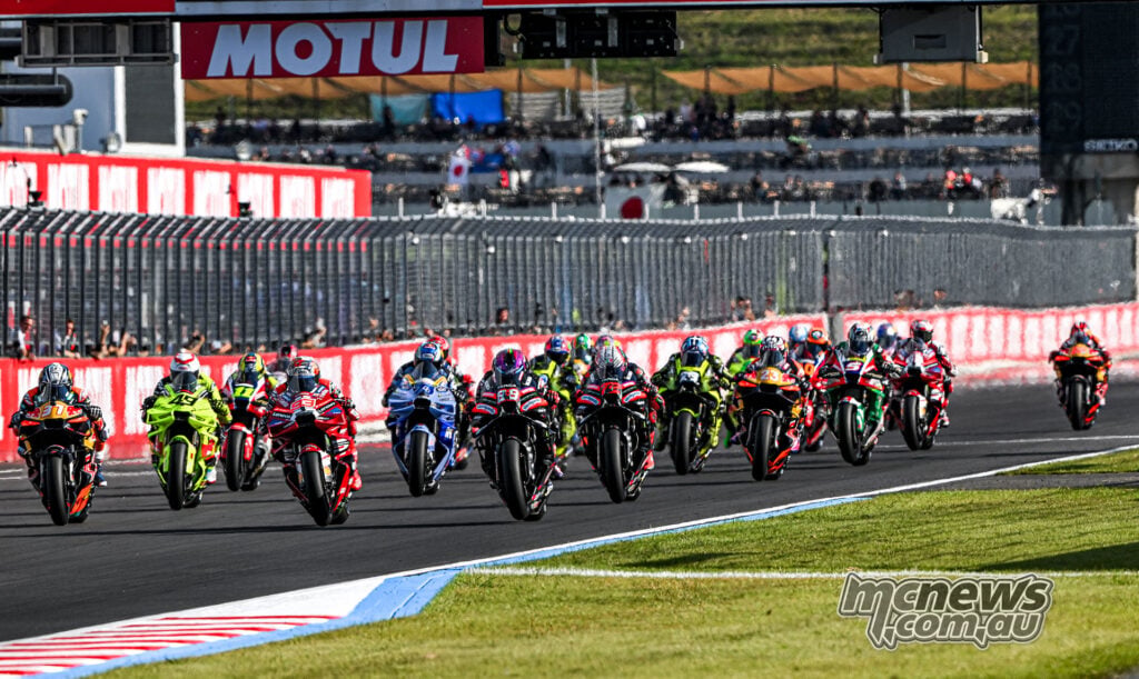 MotoGP riders accelerate away at the start of the 2026 Motegi Sprint in Japan.