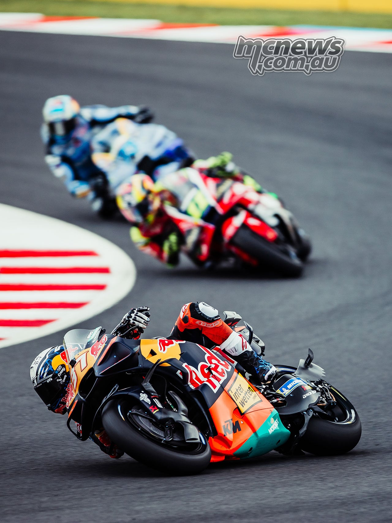 Pedro Acosta racing ahead of Diogo Moreira and Alex Marquez at Motegi