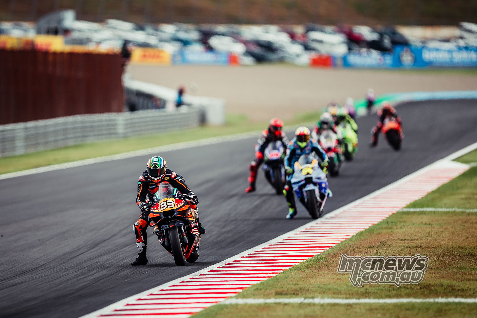 Brad Binder races with Fermin Aldeguer and Fabio Quartararo during the Japanese MotoGP