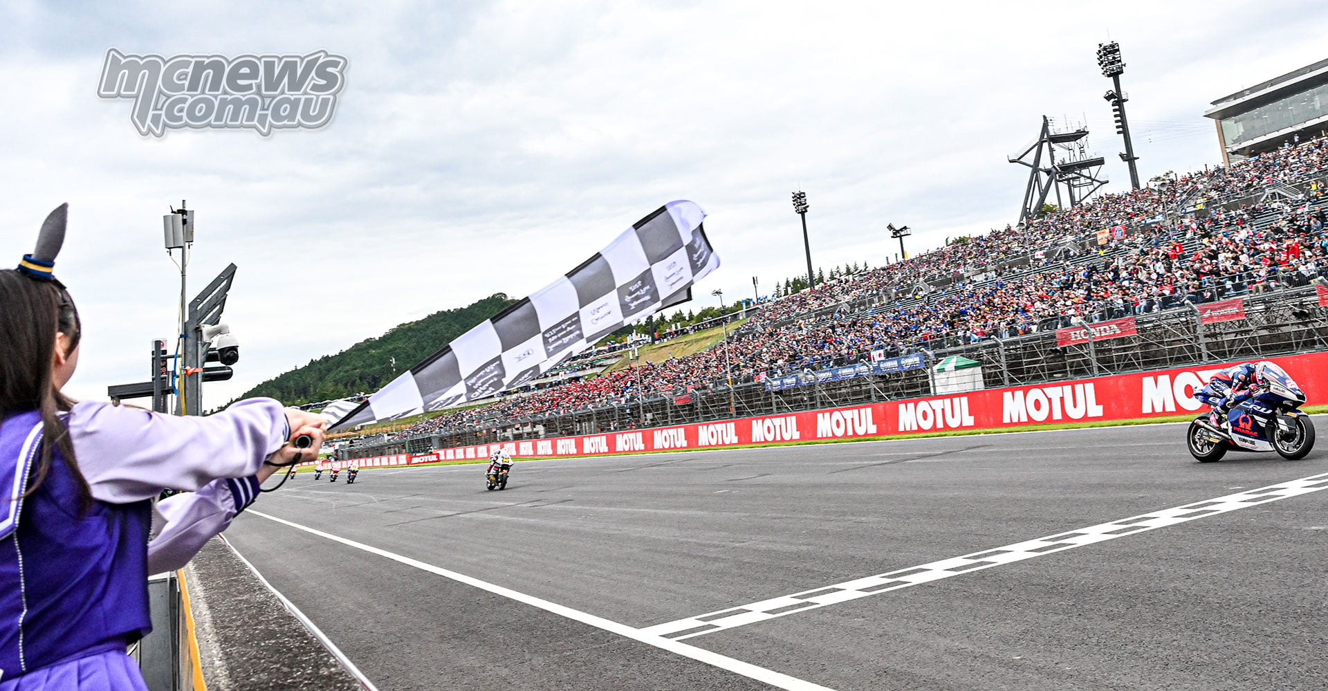 Izan Guevara crosses the finish line to win the 2026 Moto2 Japanese Grand Prix at Motegi