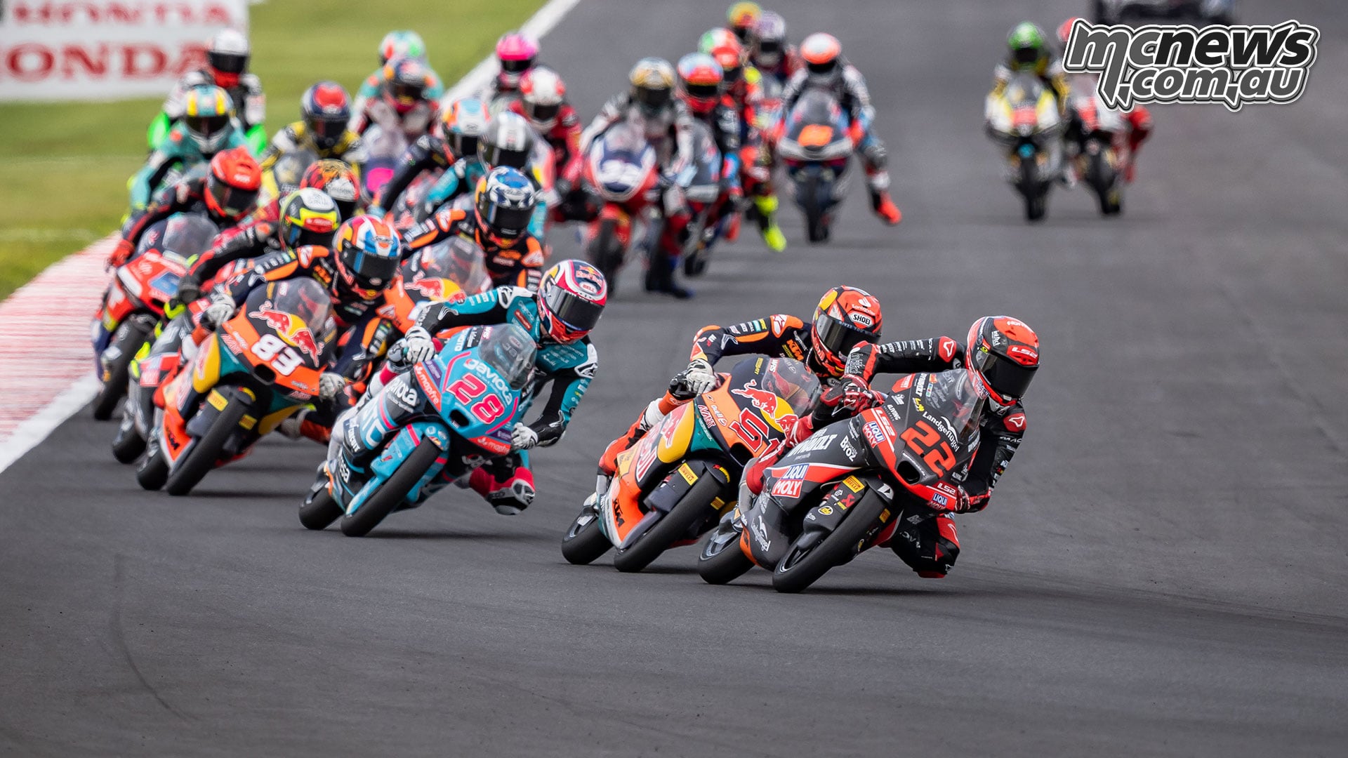 David Almansa leads Brian Uriarte David Munoz and Maximo Quiles during the early stages of the Moto3 Japanese Grand Prix