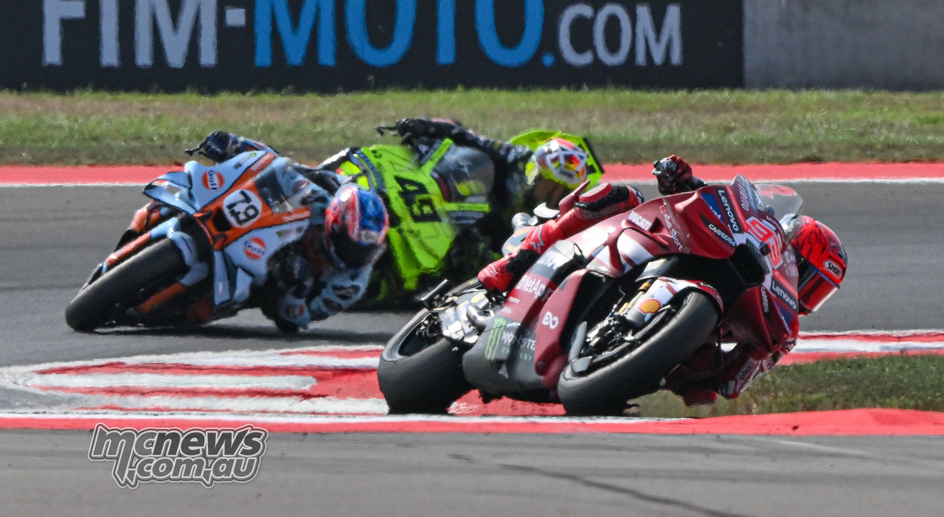 Marc Marquez leads Ai Ogura and Fabio Di Giannantonio through a right-hand corner.