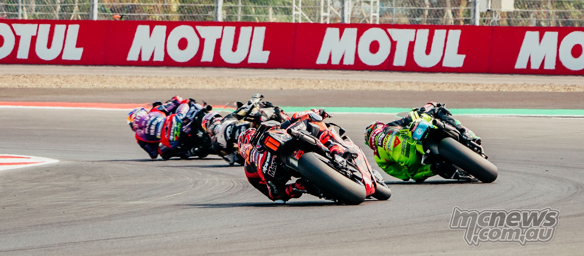 Maverick Vinales follows a group of riders through a left-hand corner at Mandalika.
