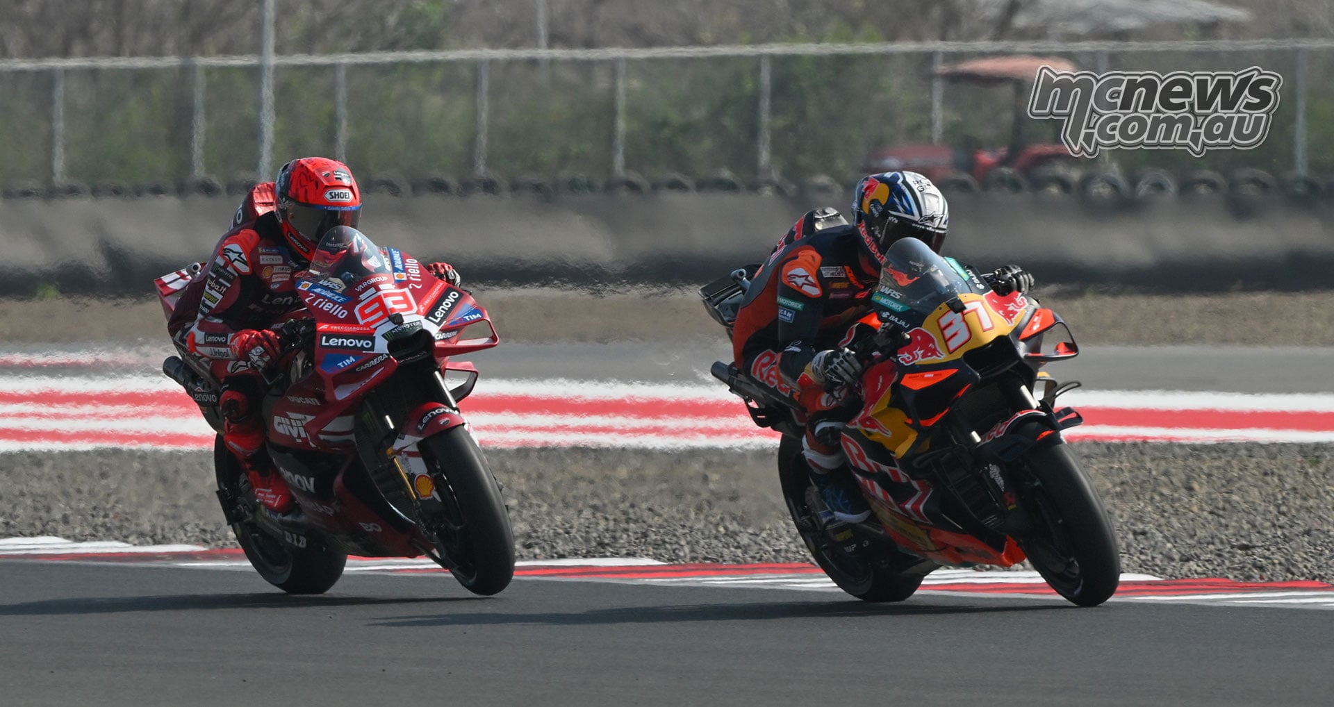 Pedro Acosta and Marc Marquez riding alongside one another at Mandalika
