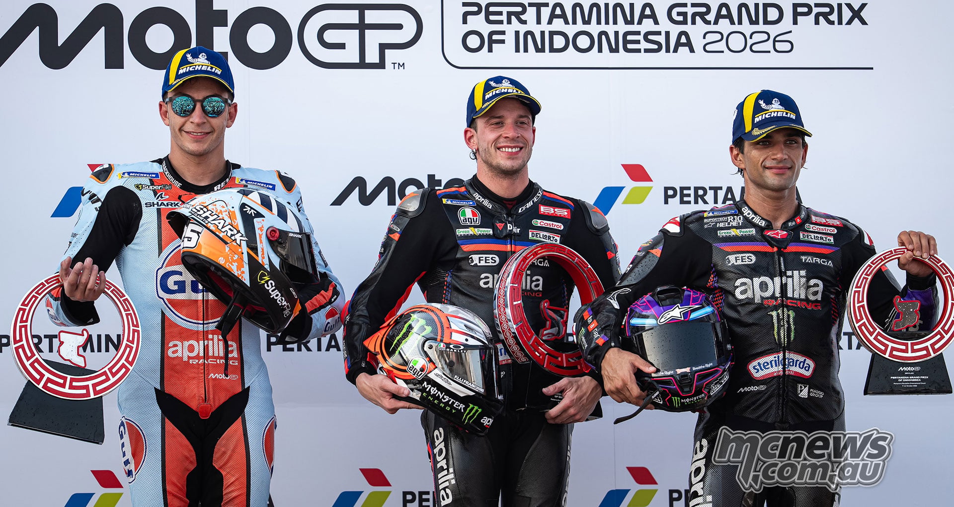 Raul Fernandez, Marco Bezzecchi and Jorge Martin posing with their Indonesian Grand Prix trophies