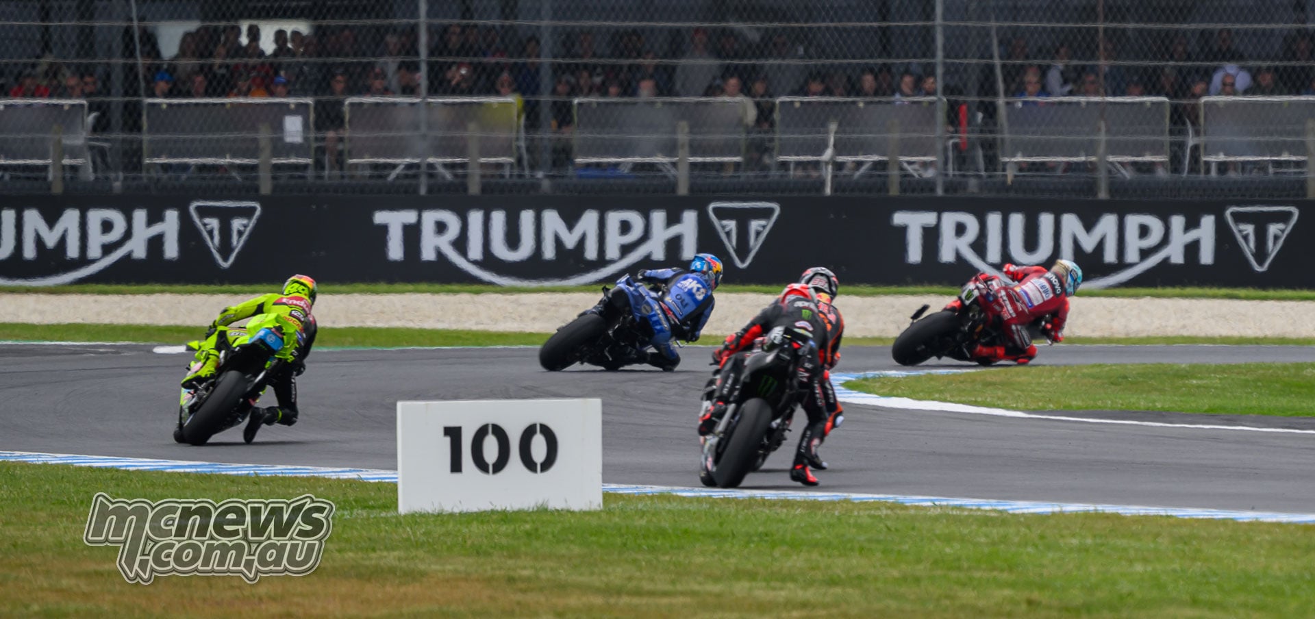 Marc and Alex Marquez negotiate a right-hand corner with Fabio Di Giannantonio and Marco Bezzecchi close behind.