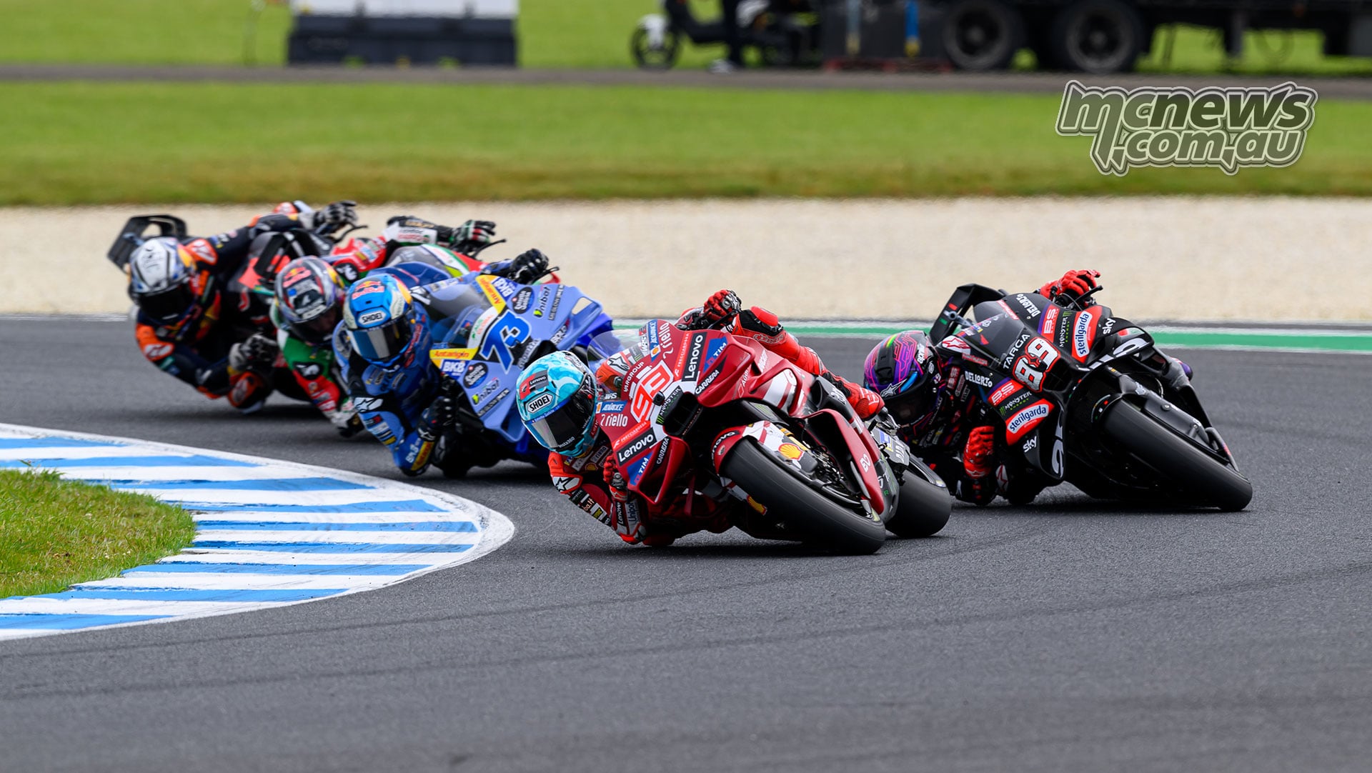 Marc Marquez and Jorge Martin run close through Turn Four, followed by Alex Marquez, Johann Zarco and Pedro Acosta.