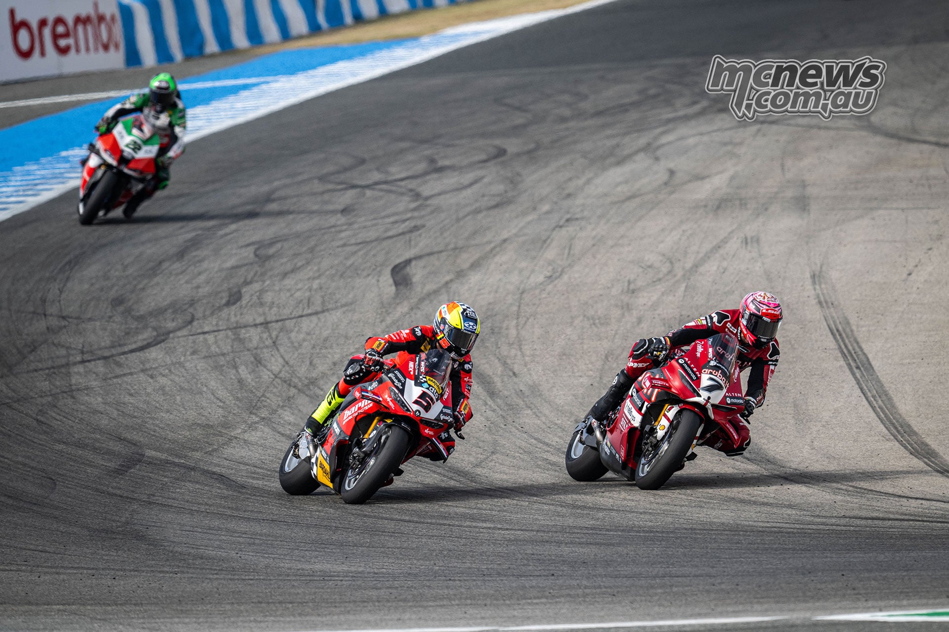 Iker Lecuona on Ducati number 7 leads Yari Montella number 5 and Alex Lowes on bimota number 22 through a Jerez corner