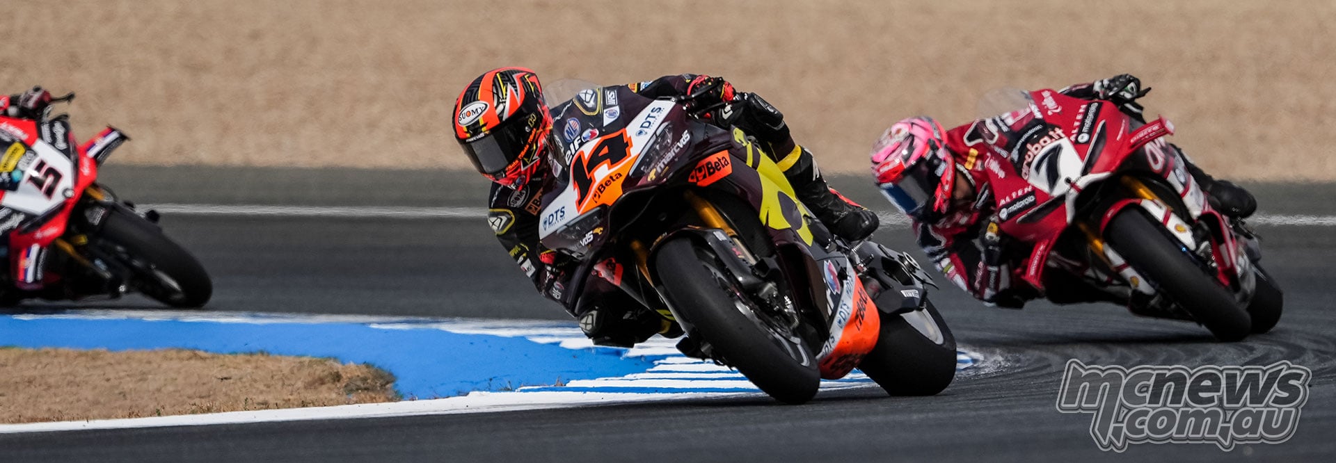 Sam Lowes on number 14 Marc VDS Ducati leads Iker Lecuona number 7 and Yari Montella number 5 through a Jerez corner