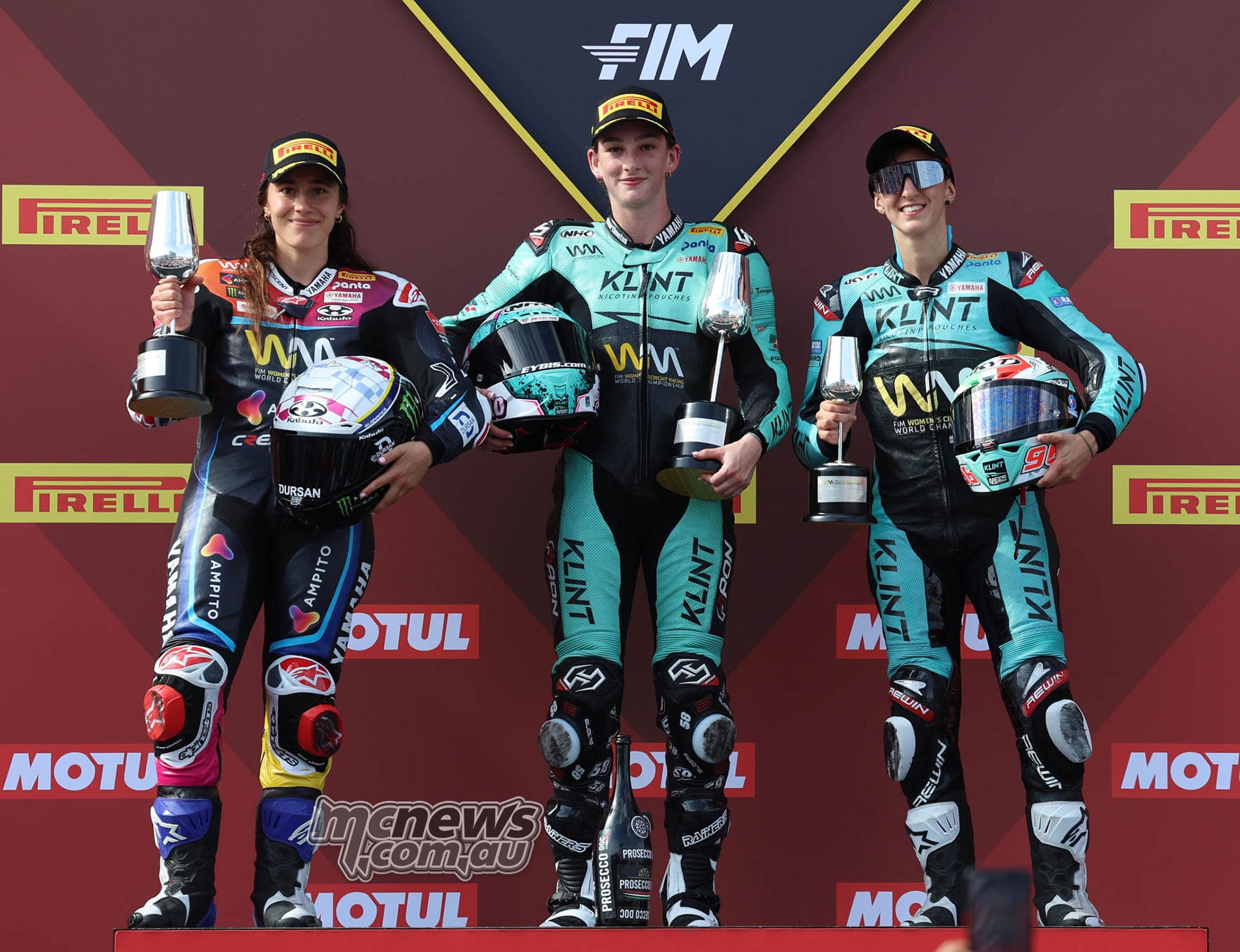 WorldWCR Jerez Race One podium with Beatriz Neila second on the left, race winner Paola Ramos in the centre and Roberta Ponziani third on the right