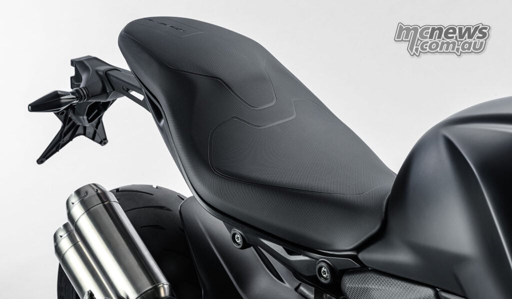 Close-up of the Monster Dark rider and passenger seat, rear bodywork and twin silencers