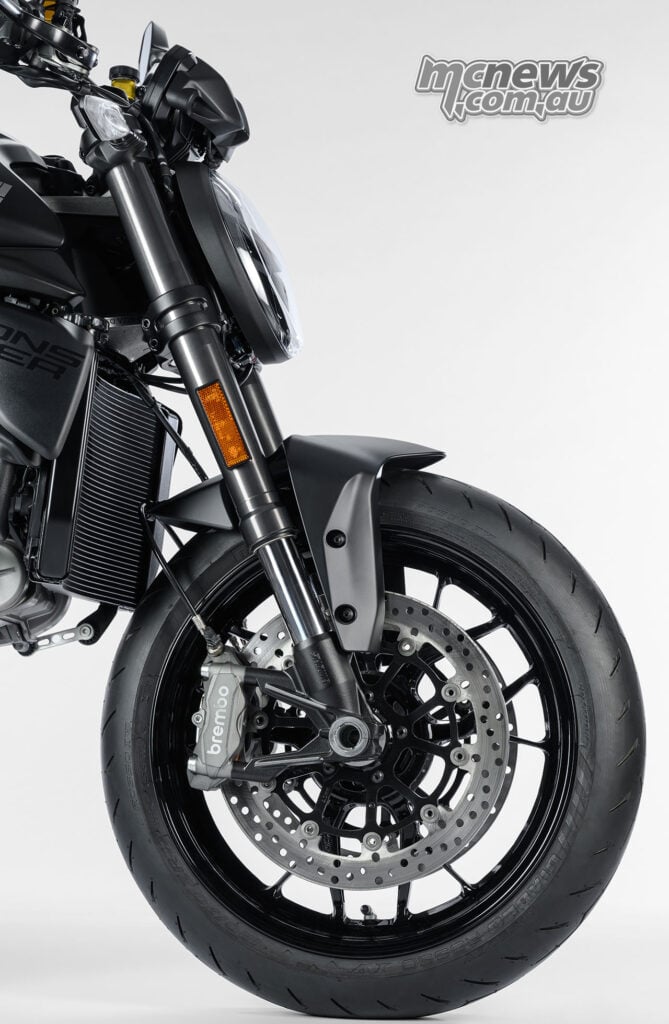 Monster Dark front wheel, Brembo brake caliper, drilled brake disc and Showa upside-down fork