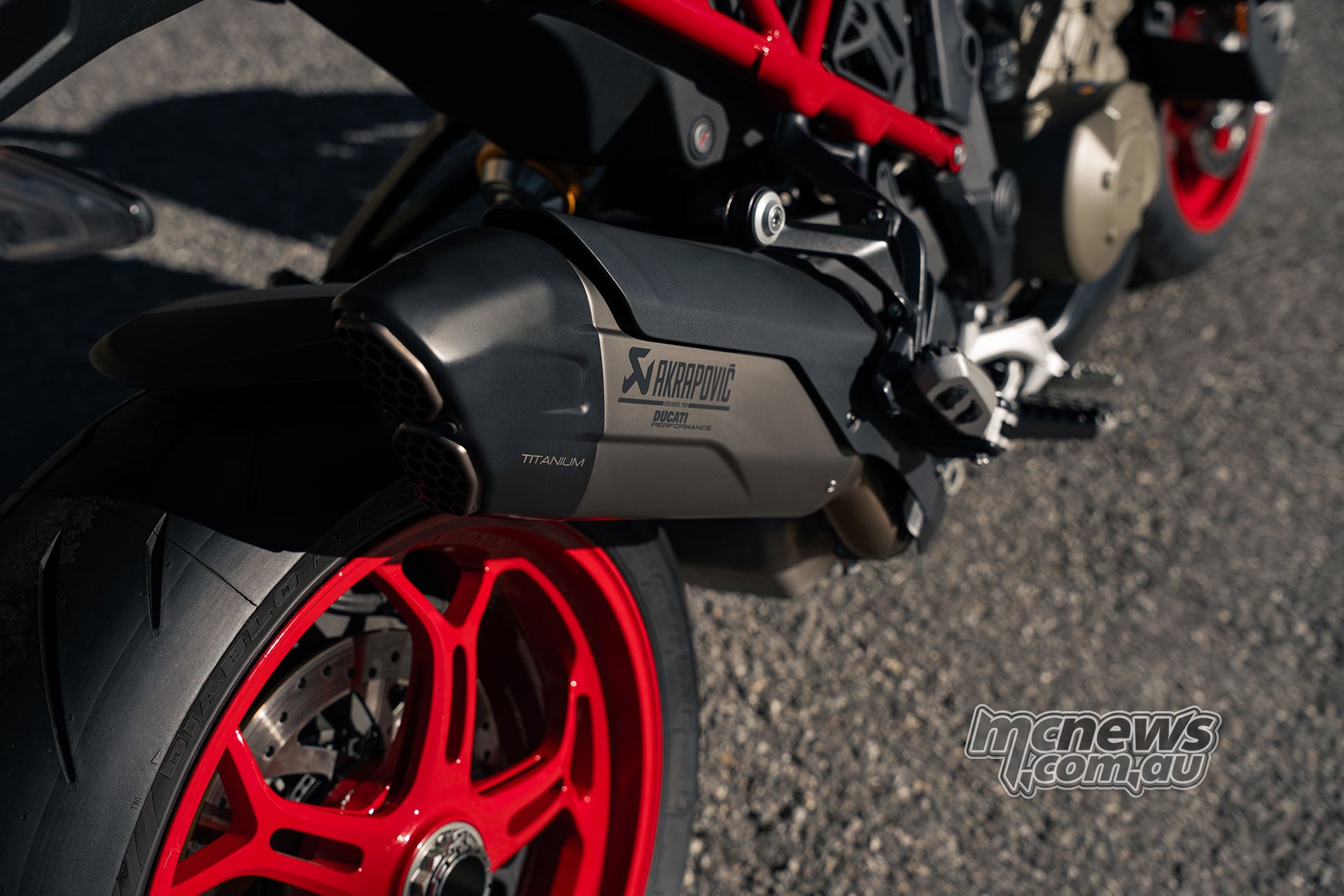 Titanium Akrapovic exhaust and optional red forged rear wheel on 2027 Ducati Multistrada V4 Pikes Peak
