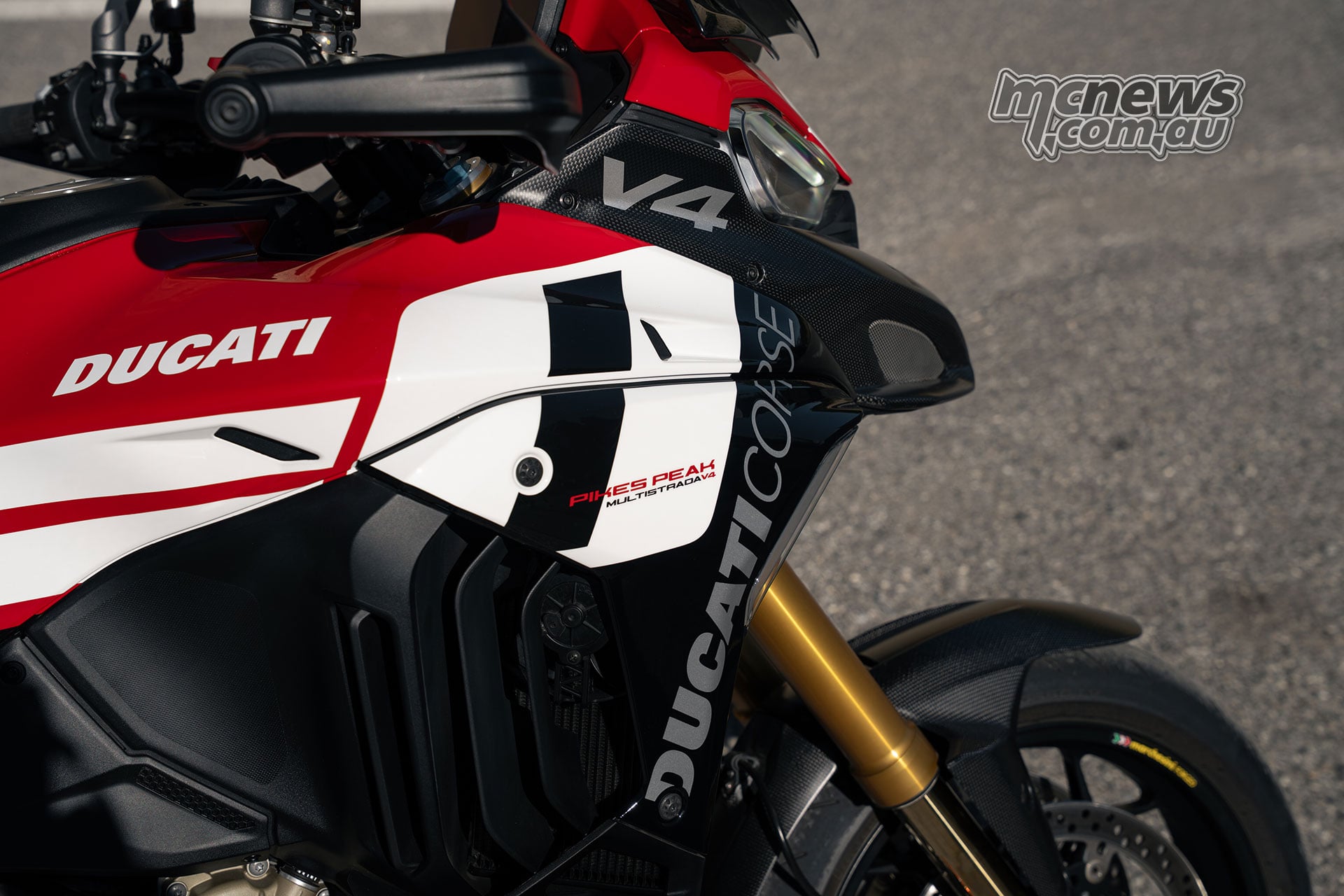 2027 Ducati Multistrada V4 Pikes Peak race-inspired fairing graphics carbon fibre and gold Ohlins fork